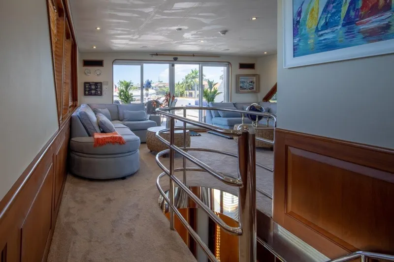 Flying Dutchman Yacht Photos Pics Luxurious interior of 1984 Lloyds Ships Tri-Deck yacht with elegant seating and modern decor.