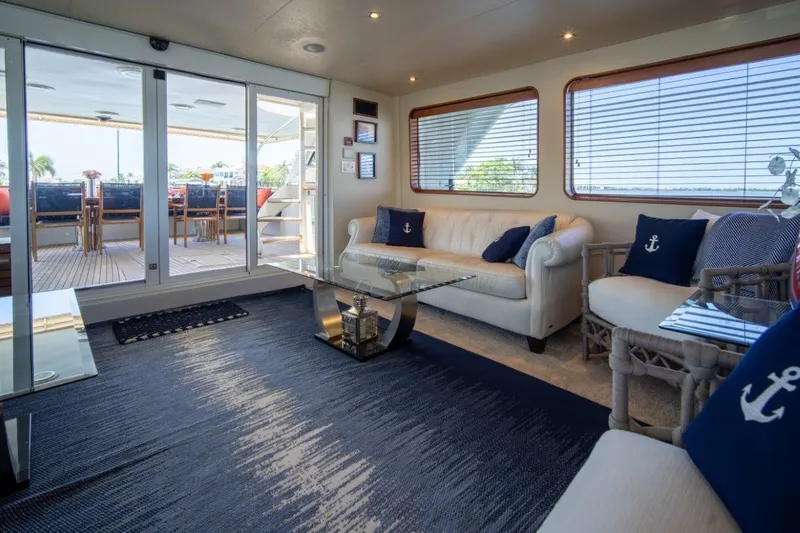 Flying Dutchman Yacht Photos Pics Luxurious 1984 Lloyds Ships Tri-Deck yacht interior with elegant seating and nautical decor.