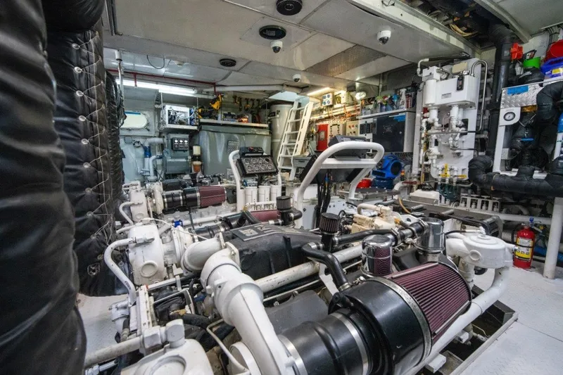 Flying Dutchman Yacht Photos Pics Engine room of 1984 Lloyds Ships Tri-Deck yacht, showcasing complex machinery and equipment.