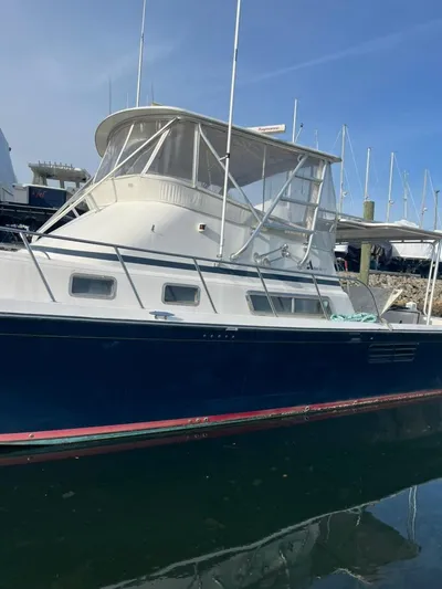 Warrior Yacht Photos Pics 2005 Albin 45 Command Bridge yacht docked in marina.