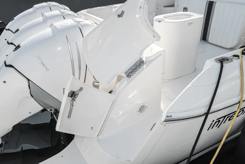 P A N D E M I C Yacht Photos Pics 2010 Intrepid 43 Sport Yacht with open hatch and powerful outboard engines.