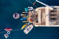 Aerial view of Custom Line 97 yacht with water sports equipment, 2007 model.