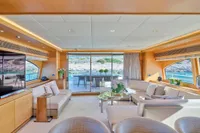 Luxurious interior of 2007 Custom Line 97 yacht with elegant seating and scenic views.