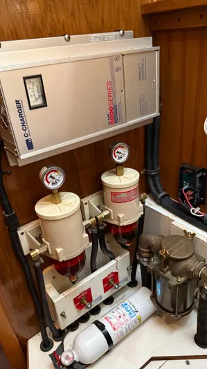  Yacht Photos Pics Catalina 470 yacht engine room with fuel filters, battery charger, and fire extinguisher, 2004 model.