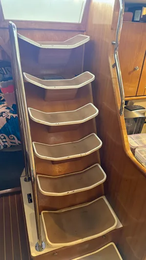  Yacht Photos Pics Wooden interior stairs on a 2004 Catalina 470 yacht.