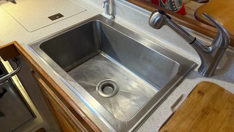  Yacht Photos Pics Stainless steel sink and faucet in 2004 Catalina 470 yacht kitchen.