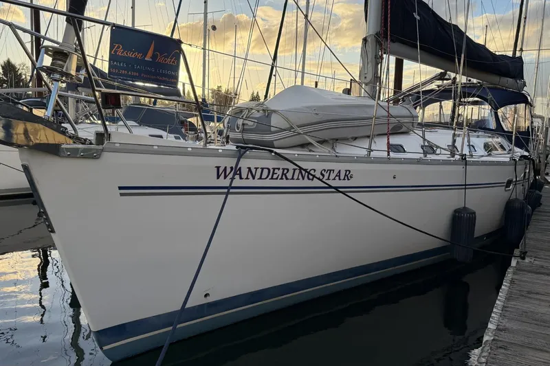  Yacht Photos Pics Catalina 470 sailboat named "Wandering Star" docked at marina, 2004 model.