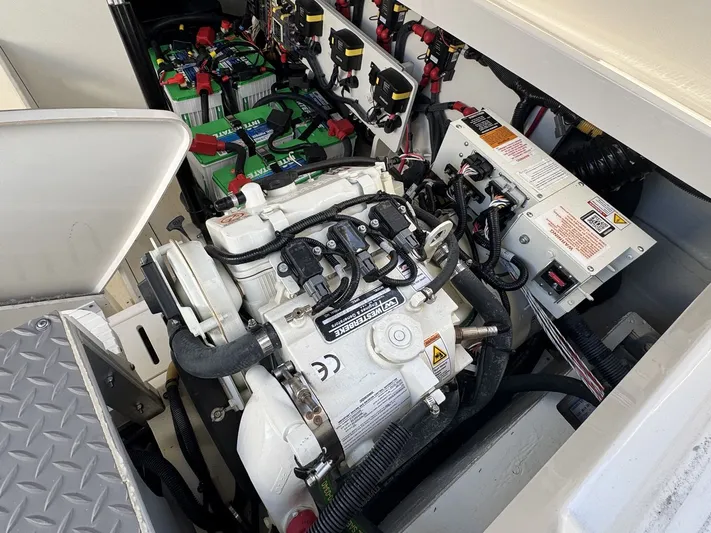  Yacht Photos Pics Engine compartment of 2024 Sea Ray Sundancer 320 Outboard with batteries and wiring.