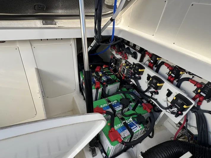  Yacht Photos Pics 2024 Sea Ray Sundancer 320 Outboard battery compartment with wiring and components.