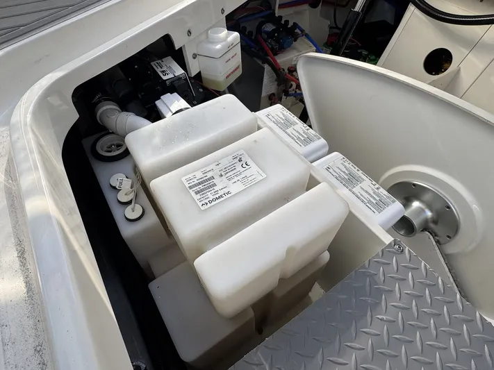  Yacht Photos Pics 2024 Sea Ray Sundancer 320 Outboard engine compartment with Dometic components and storage.