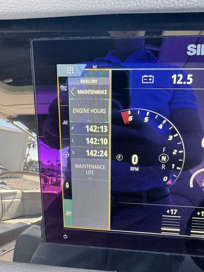  Yacht Photos Pics 2024 Sea Ray Sundancer 320 Outboard dashboard displaying engine hours and maintenance information.