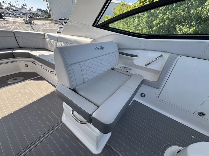  Yacht Photos Pics 2024 Sea Ray Sundancer 320 Outboard interior with luxurious seating and modern design.