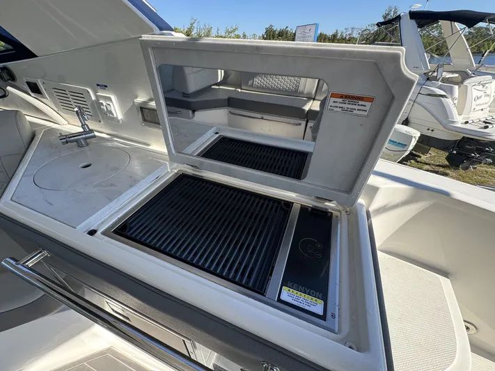  Yacht Photos Pics Outdoor grill and sink on 2024 Sea Ray Sundancer 320 Outboard boat.