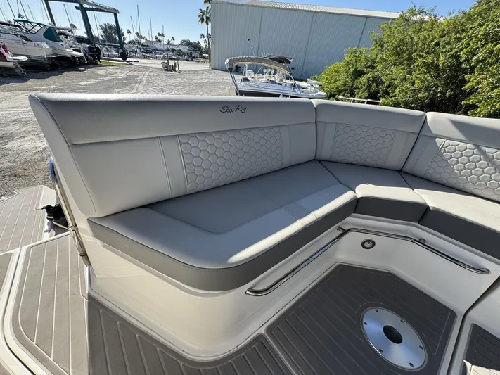  Yacht Photos Pics 2024 Sea Ray Sundancer 320 Outboard, featuring luxurious seating and modern design.