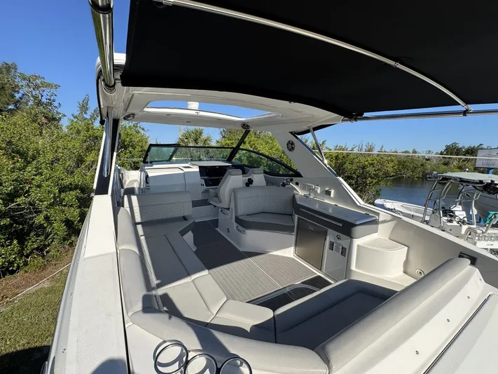  Yacht Photos Pics 2024 Sea Ray Sundancer 320 Outboard interior with spacious seating and modern amenities.