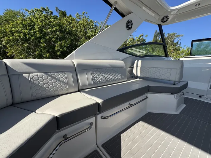  Yacht Photos Pics 2024 Sea Ray Sundancer 320 Outboard interior with sleek gray seating and modern design.