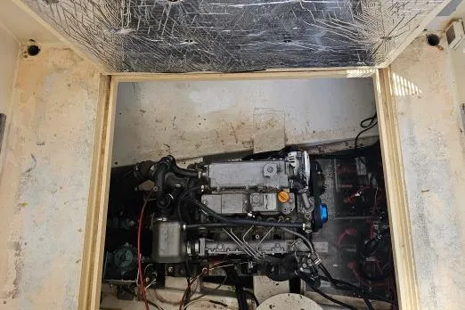 Tien Hou Yacht Photos Pics Engine compartment of 2002 Parker Marine Enterprises Lorcha 50 boat, showing detailed machinery.