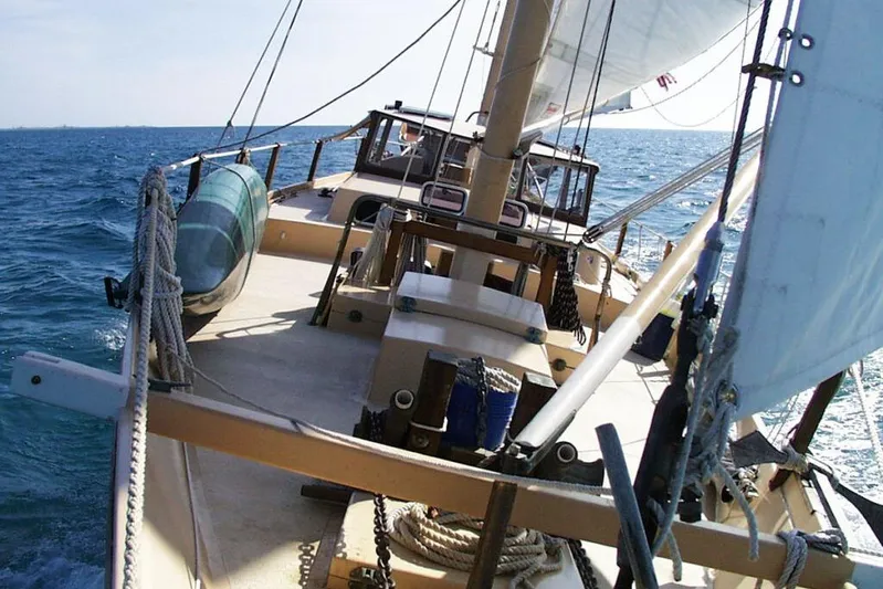 Tien Hou Yacht Photos Pics Sailing on a 2002 Parker Marine Enterprises Lorcha 50 in open sea.