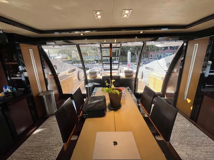 Izumi Yacht Photos Pics Luxurious interior of a 2008 Palmer Johnson 120 yacht with elegant dining area.