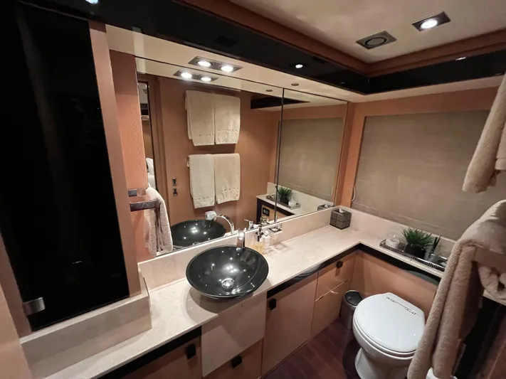 Izumi Yacht Photos Pics Luxurious bathroom in a 2008 Palmer Johnson 120 yacht, featuring modern fixtures and elegant design.