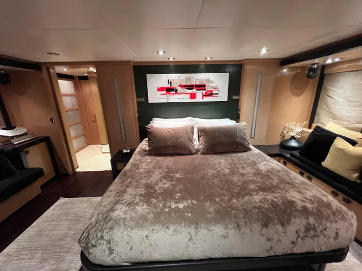 Izumi Yacht Photos Pics Luxurious bedroom interior of 2008 Palmer Johnson 120 yacht with modern decor and plush bedding.