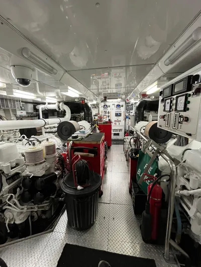 Izumi Yacht Photos Pics Engine room of a 2008 Palmer Johnson 120 yacht, featuring machinery and control panels.