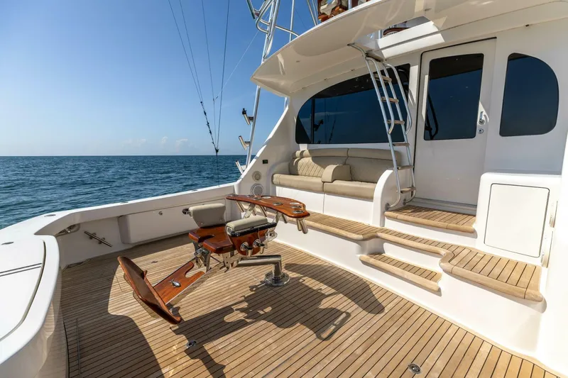Da'grits Yacht Photos Pics 2018 Viking 62 Convertible yacht deck with fishing chair and seating area.