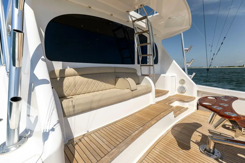 Da'grits Yacht Photos Pics Luxurious 2018 Viking 62 Convertible yacht deck with seating and ocean view.