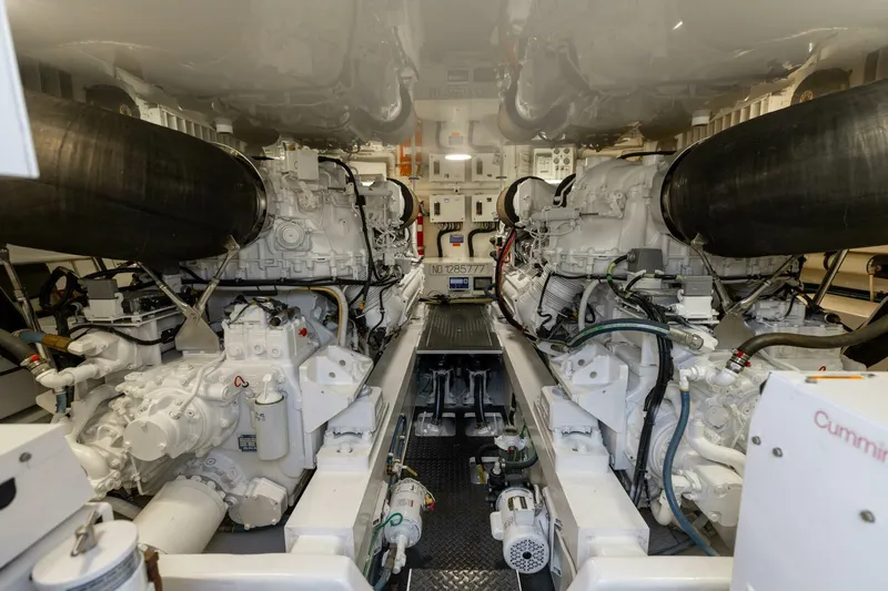 Da'grits Yacht Photos Pics Engine room of 2018 Viking 62 Convertible yacht, featuring dual powerful engines.