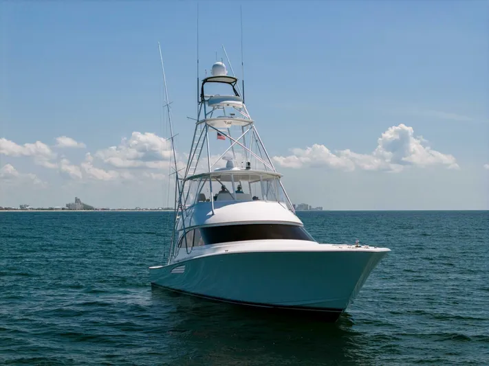 Da'grits Yacht Photos Pics 2018 Viking 62 Convertible yacht on open sea under clear sky.