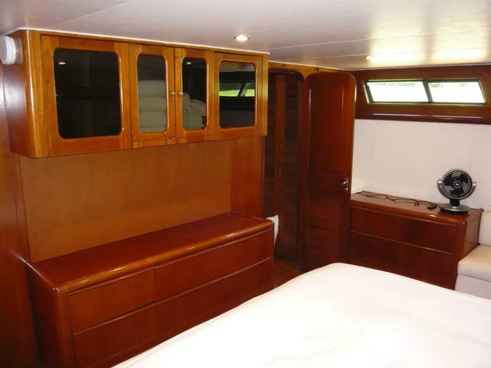 Vitamin Sea Yacht Photos Pics Luxurious wood interior of 1990 Viking Cockpit Motor Yacht cabin.