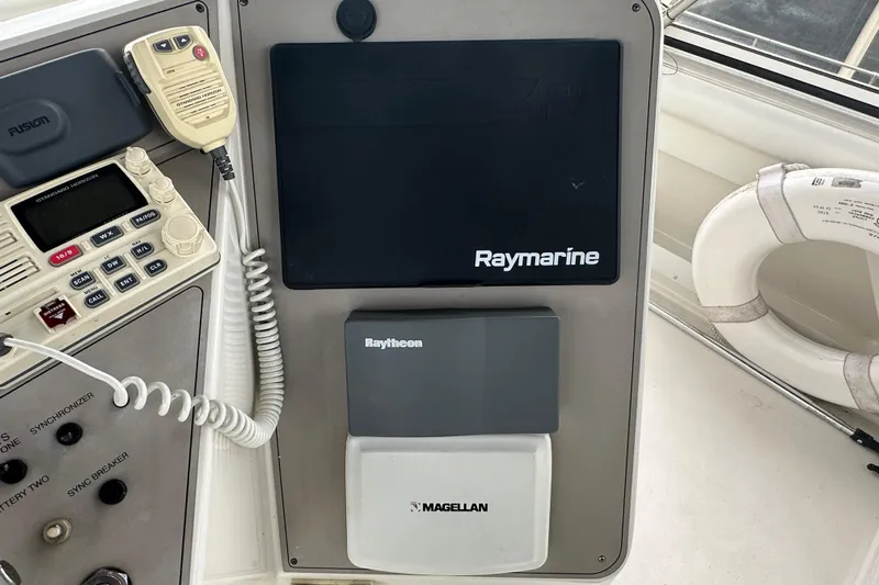  Yacht Photos Pics Control panel of a 1998 Carver 445 Aft Cabin Motor Yacht with navigation equipment.