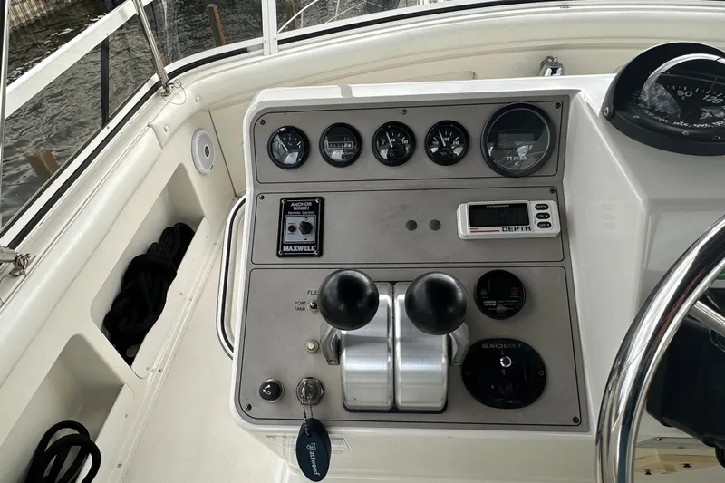  Yacht Photos Pics Control panel of a 1998 Carver 445 Aft Cabin Motor Yacht with gauges and controls.