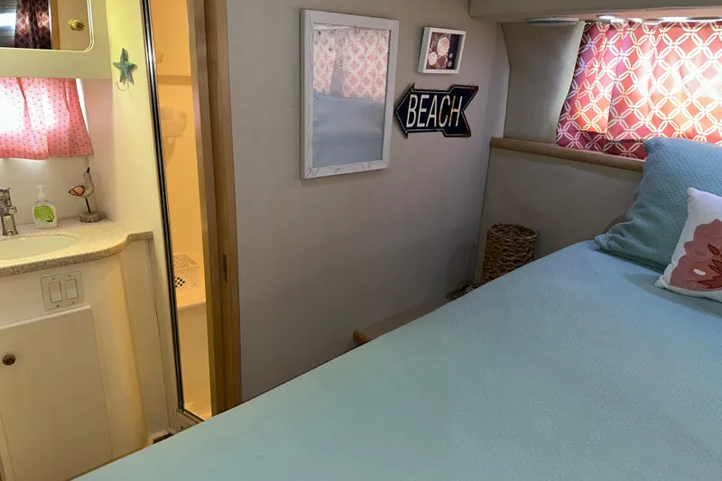  Yacht Photos Pics Interior of 1998 Carver 445 Aft Cabin Motor Yacht with cozy bedroom and bathroom.