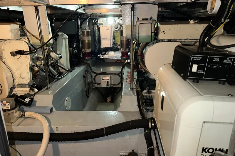  Yacht Photos Pics Engine room of 1998 Carver 445 Aft Cabin Motor Yacht, showcasing mechanical components.