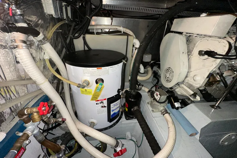  Yacht Photos Pics Engine room of 1998 Carver 445 Aft Cabin Motor Yacht with mechanical components.