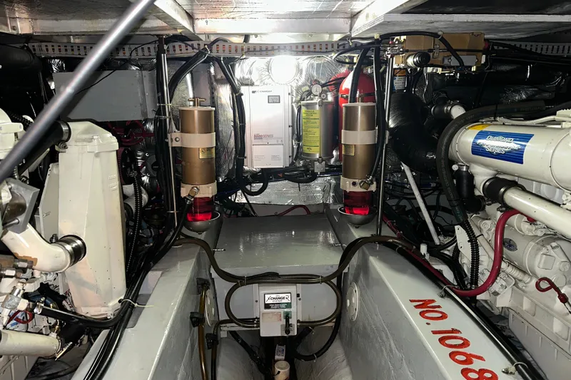  Yacht Photos Pics Engine room of 1998 Carver 445 Aft Cabin Motor Yacht, showcasing mechanical components.