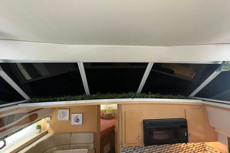  Yacht Photos Pics Interior of 1998 Carver 445 Aft Cabin Motor Yacht with modern kitchen amenities.