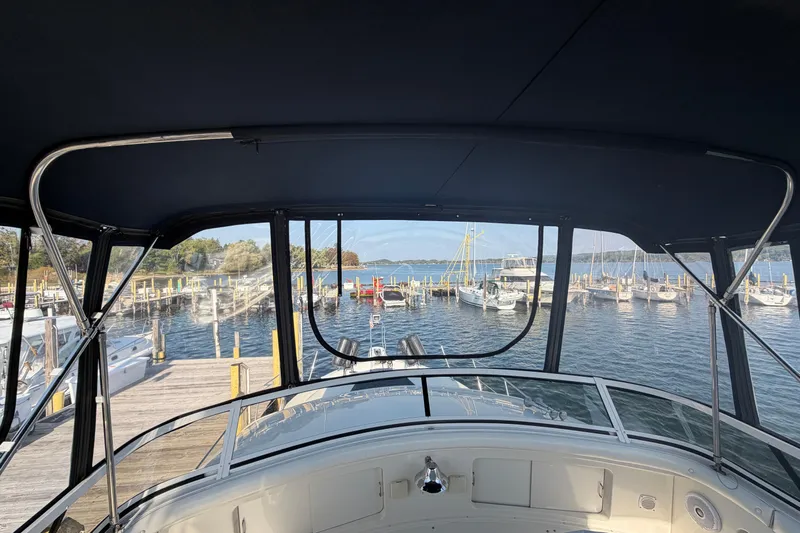  Yacht Photos Pics View from 1998 Carver 445 Aft Cabin Motor Yacht overlooking marina and docked boats.