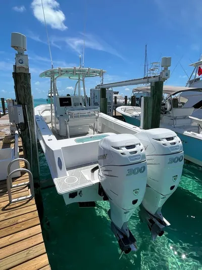  Yacht Photos Pics 2016 Contender 28 Sport boat docked with twin 300 horsepower engines.