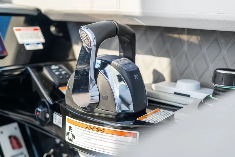  Yacht Photos Pics Throttle control of 2020 Sea Ray 400 SLX Outboard boat, featuring modern design and warning labels.