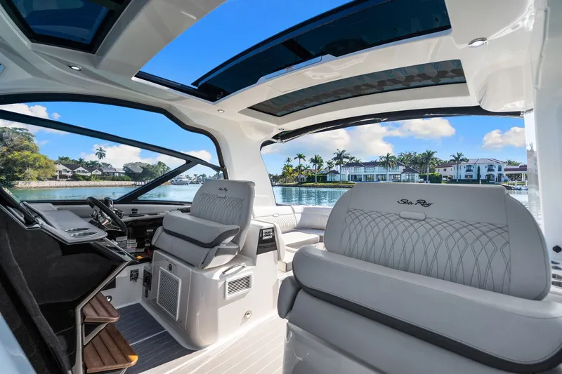  Yacht Photos Pics Luxurious interior of 2020 Sea Ray 400 SLX Outboard with waterfront view.