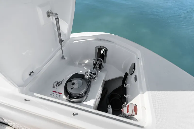  Yacht Photos Pics 2020 Sea Ray 400 SLX Outboard anchor compartment with open hatch, showing marine equipment.