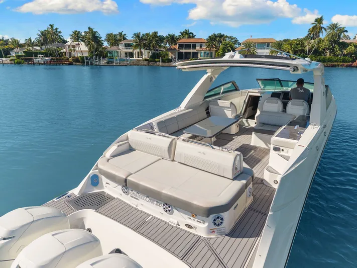  Yacht Photos Pics 2020 Sea Ray 400 SLX Outboard luxury boat on serene water with elegant seating.