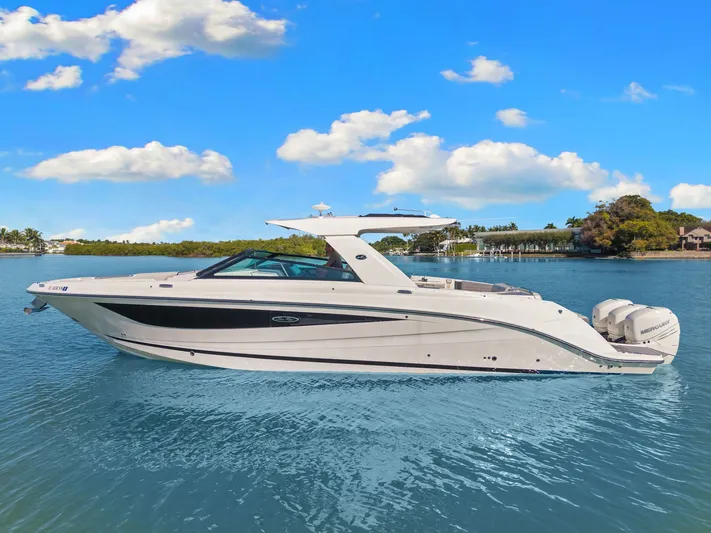  Yacht Photos Pics 2020 Sea Ray 400 SLX Outboard boat on calm water under blue sky.