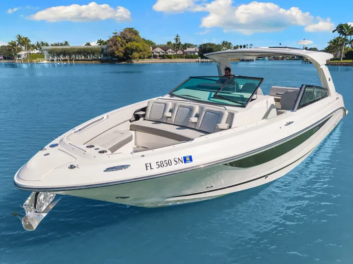  Yacht Photos Pics 2020 Sea Ray 400 SLX Outboard boat on calm blue water.