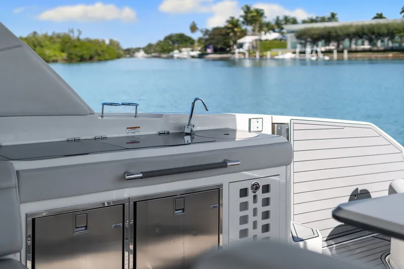  Yacht Photos Pics Sea Ray 400 SLX Outboard 2020 overlooking calm waters.