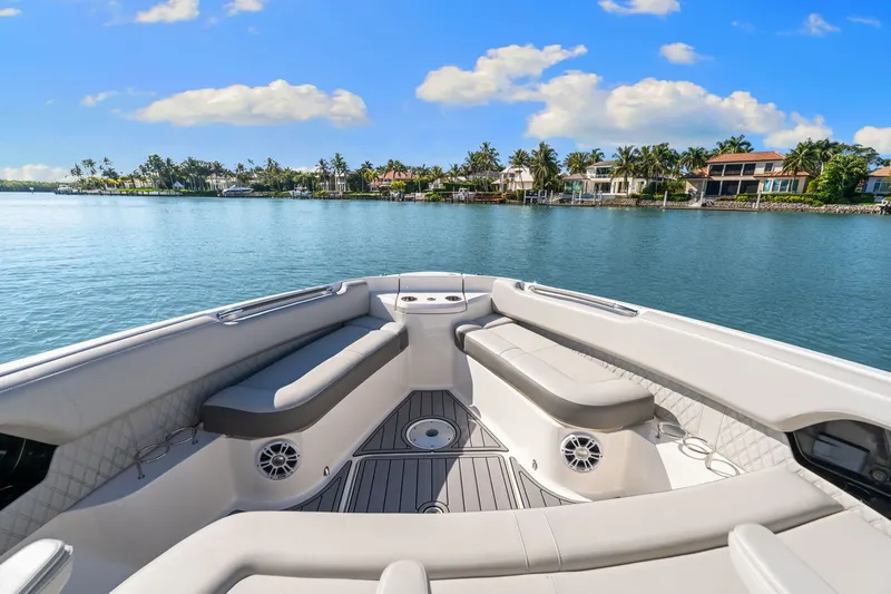  Yacht Photos Pics Interior view of 2020 Sea Ray 400 SLX Outboard on calm waters.