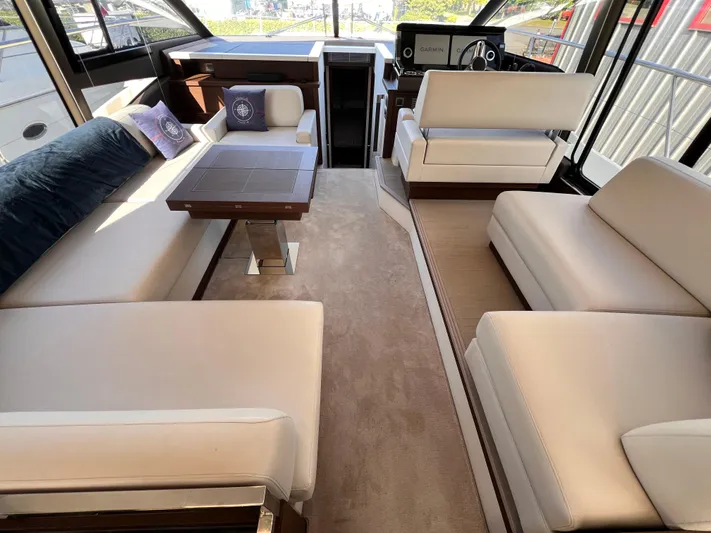  Yacht Photos Pics Luxurious interior of 2023 Prestige 520 yacht with elegant seating and modern design.