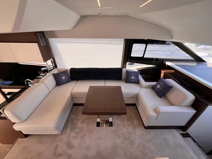  Yacht Photos Pics Luxurious interior of 2023 Prestige 520 yacht with elegant seating and modern design.